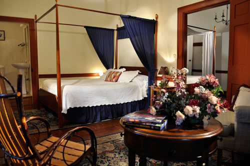 Adjoining rooms, each with a double size four poster bed at the Jean Bonnet Tavern, Bedford, PA