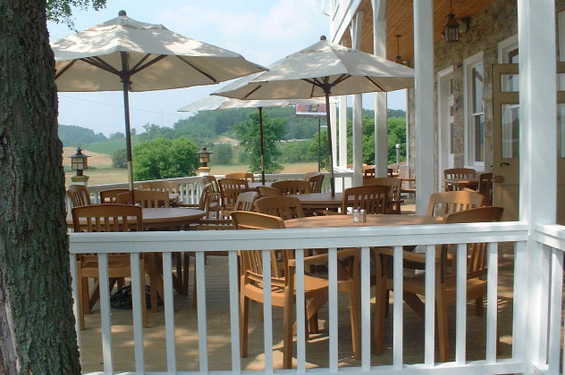 View of Dining Tables on Jean Bonnet Porch