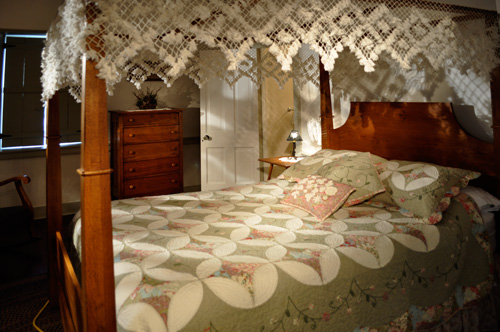 Hand knotted lace canopy over queen size bed at the Jean Bonnet B&B, Bedford, PA 